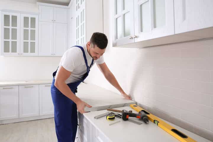 A kitchen countertop made of a durable and stain-resistant material, designed for easy maintenance in Binghamton